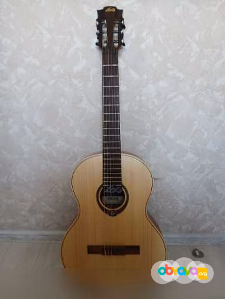 Классическую гитару 